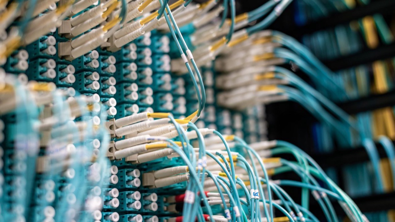Fiber-optic patch panel routing encrypted network traffic