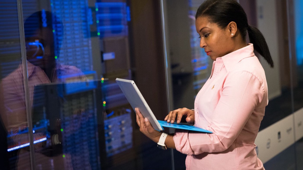 Local engineer working hands-on in the server room